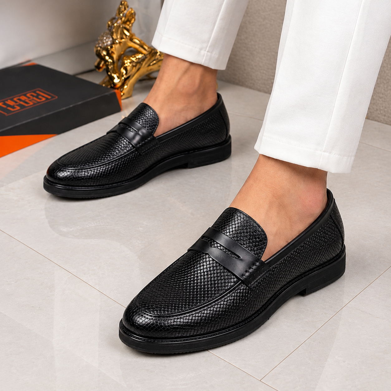 Black Woven Loafers in Luxury Interior